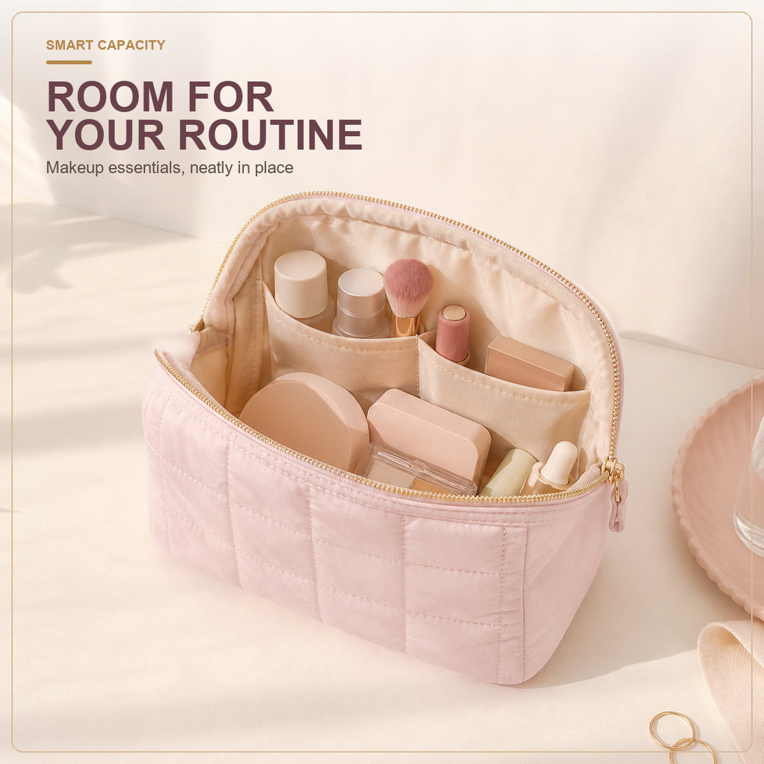Open quilted makeup bag filled with cosmetics and skincare